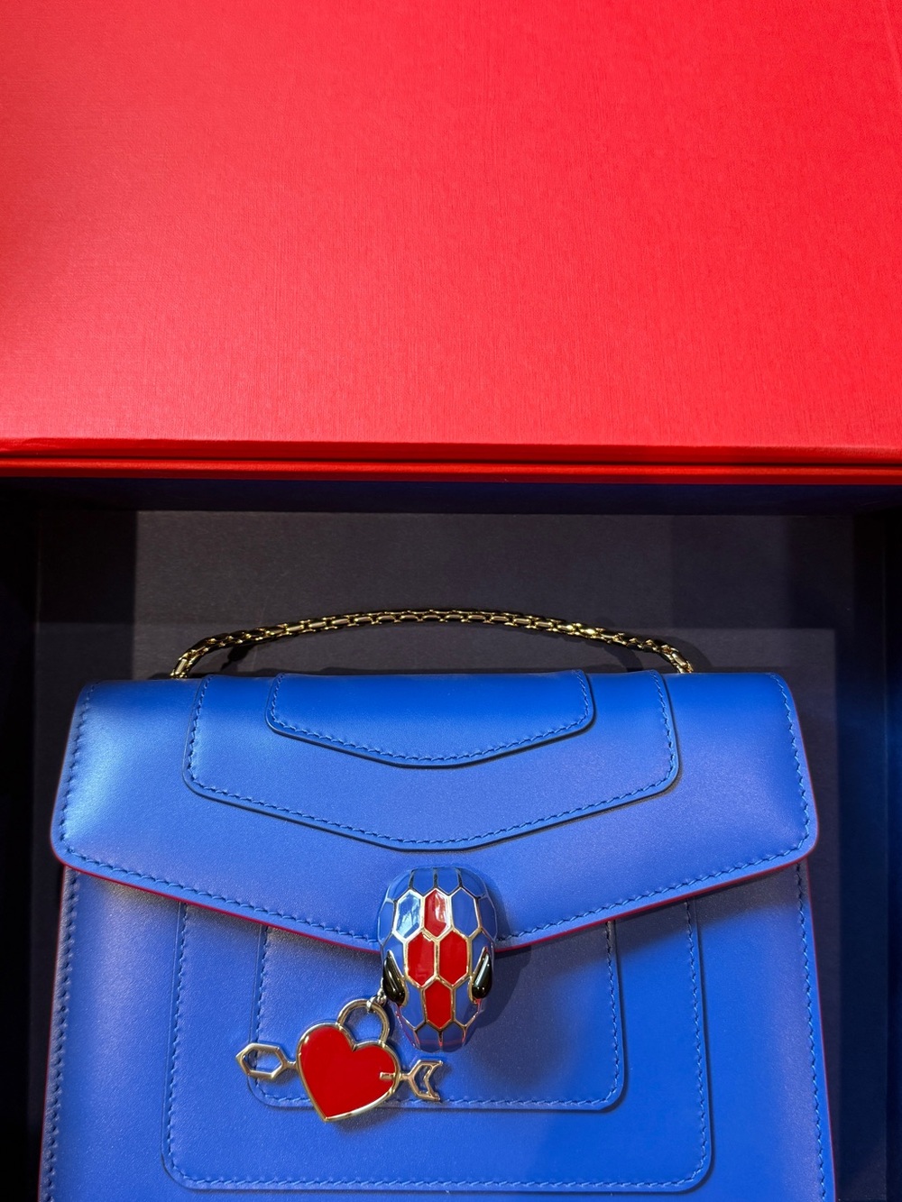 Bulgari Serpenti Forever Pop Heart Bag in electric blue with red enamel detail